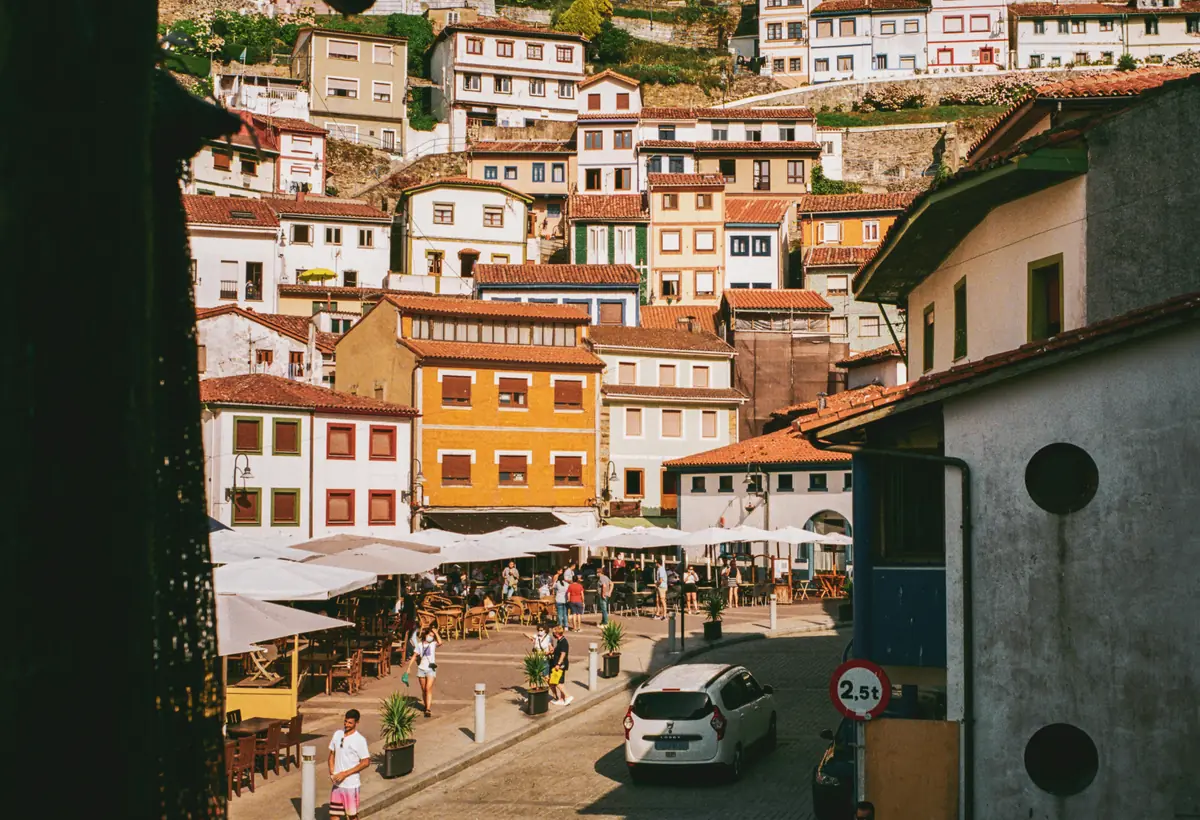 Terracotta houses above a harbour in Cudillero, Spain